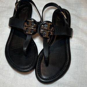 Tory Burch Black Sandals with Gold Emblem